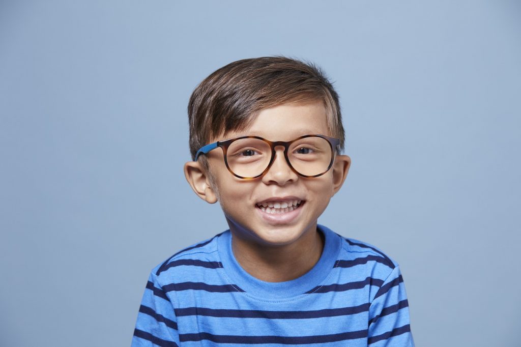 Young boy with glasses